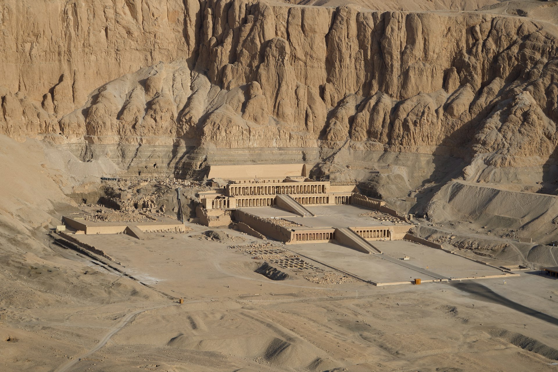 an aerial view of a large building in the desert